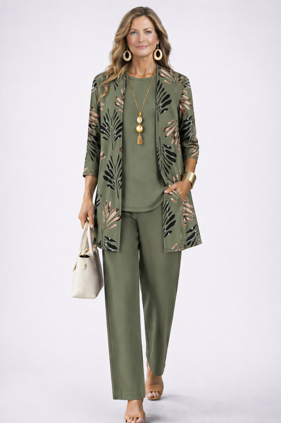 Olive green three-piece trouser set with leaf-pattern jacket and matching top