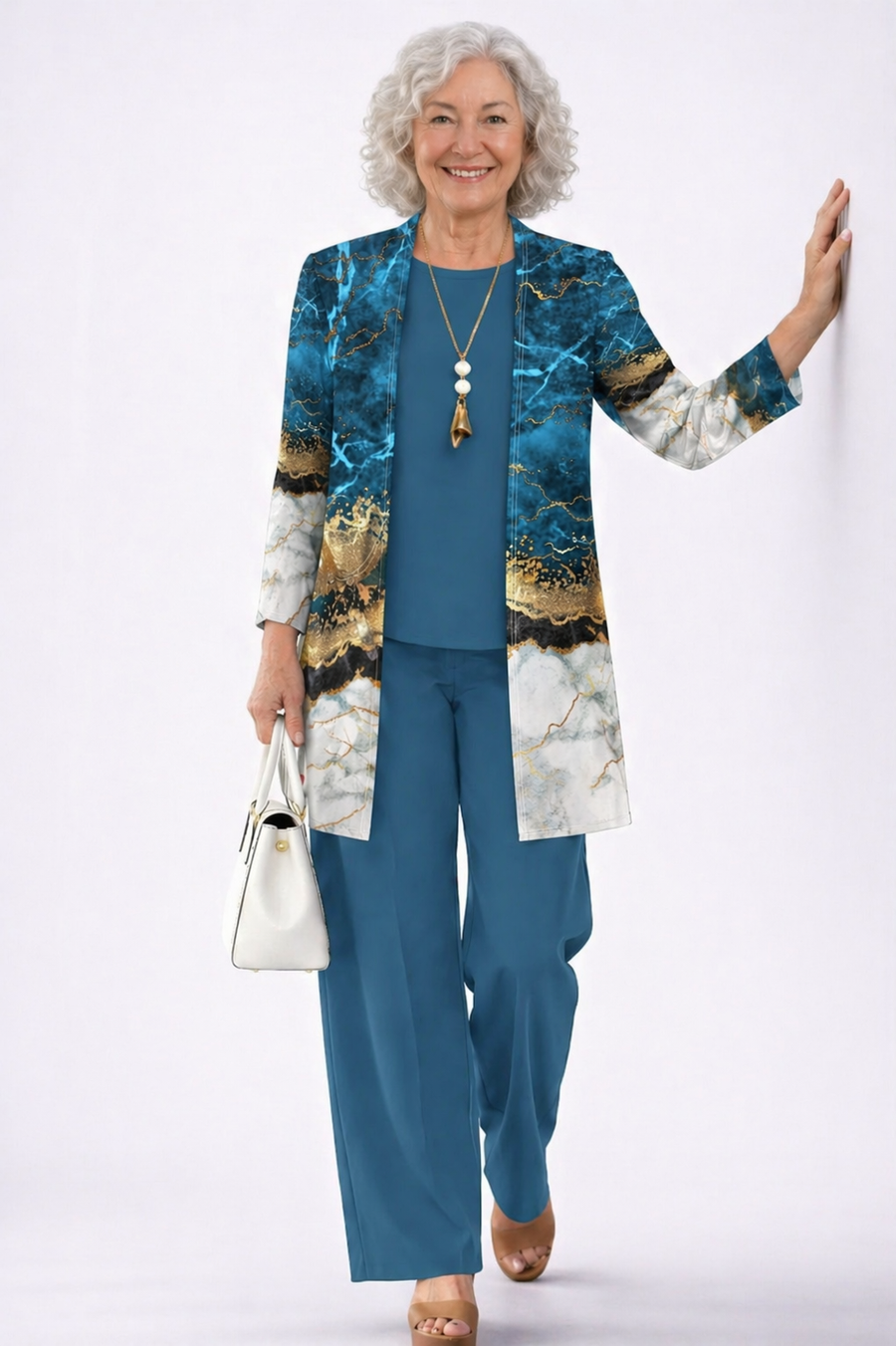 Elegant three-piece trouser set with printed long jacket, blue top and matching blue trousers