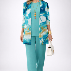 Three-piece trouser set: turquoise pants with matching top and patterned jacket