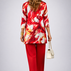 Three-piece trouser set: red trousers with patterned tunic top and matching open jacket