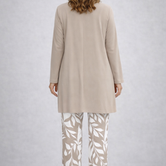 Beige three-piece trouser set, long back tunic over white leaf-print trousers