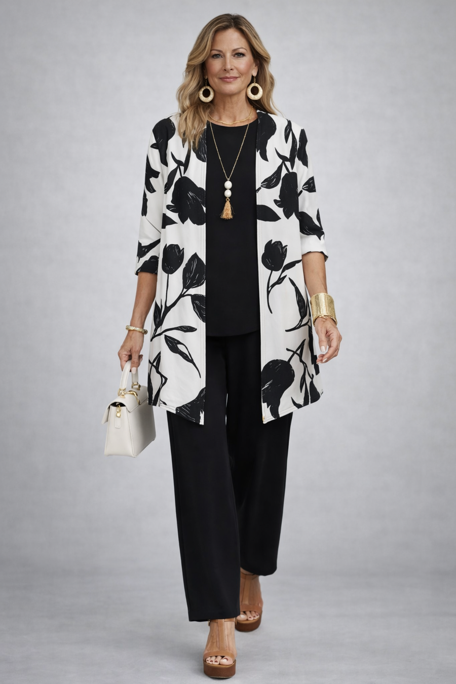 Three-piece trouser set: white floral open-front jacket, black trousers, black top