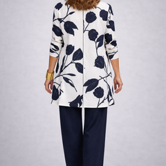 ANNETTE elegant three-piece trouser set: back view of floral white jacket and navy trousers