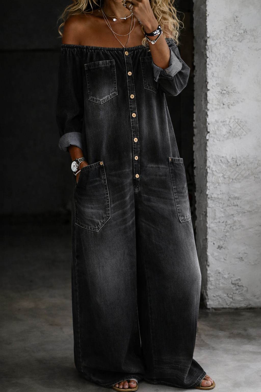 Black off-shoulder denim long-sleeve overall with front buttons and utility chest pocket