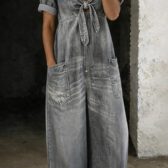 Grey washed denim V-neck short-sleeve overall with tie front and two front pockets