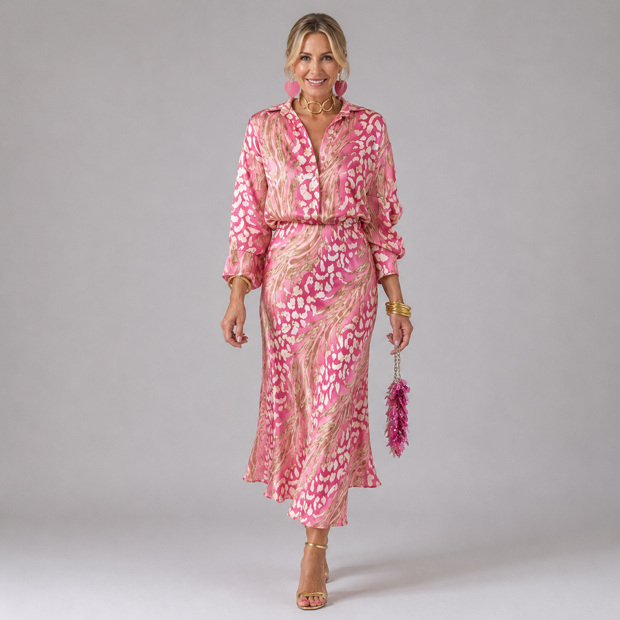 Pink patterned wrap midi dress with tie waist, long sleeves, and ruffled hem
