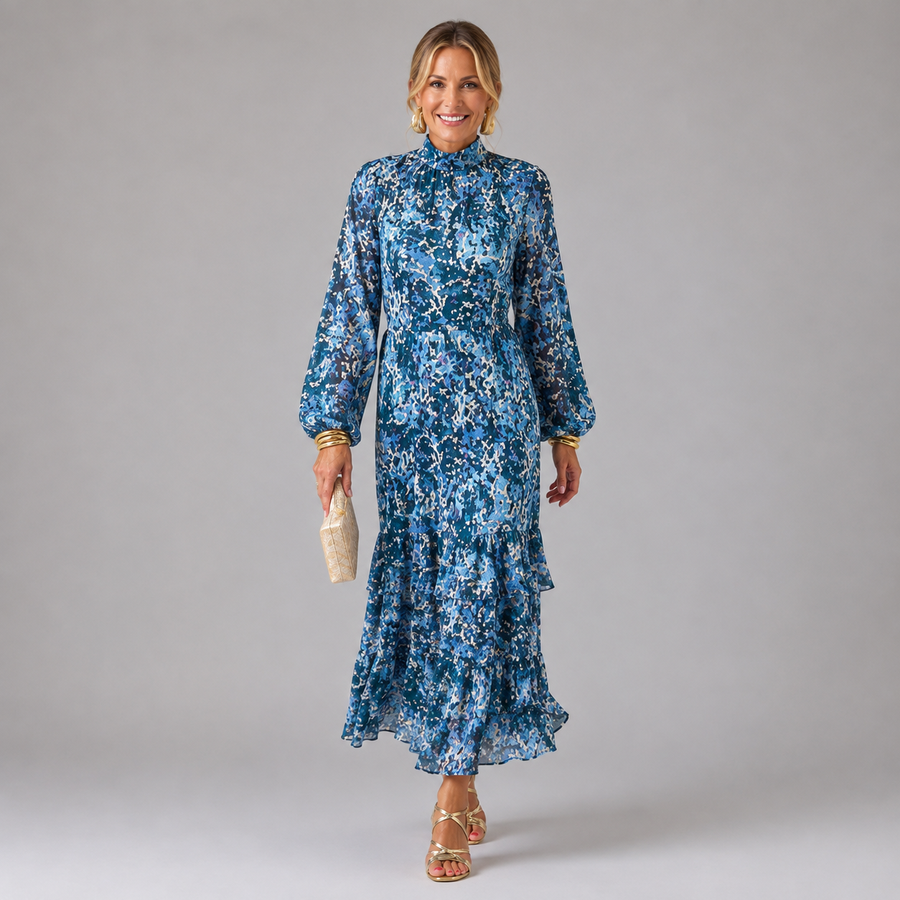 Blue abstract patterned maxi dress with high neck, long sleeves, and tiered skirt