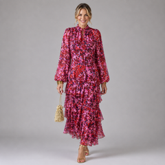 Pink floral tiered midi dress with long puff sleeves and ruffled hem
