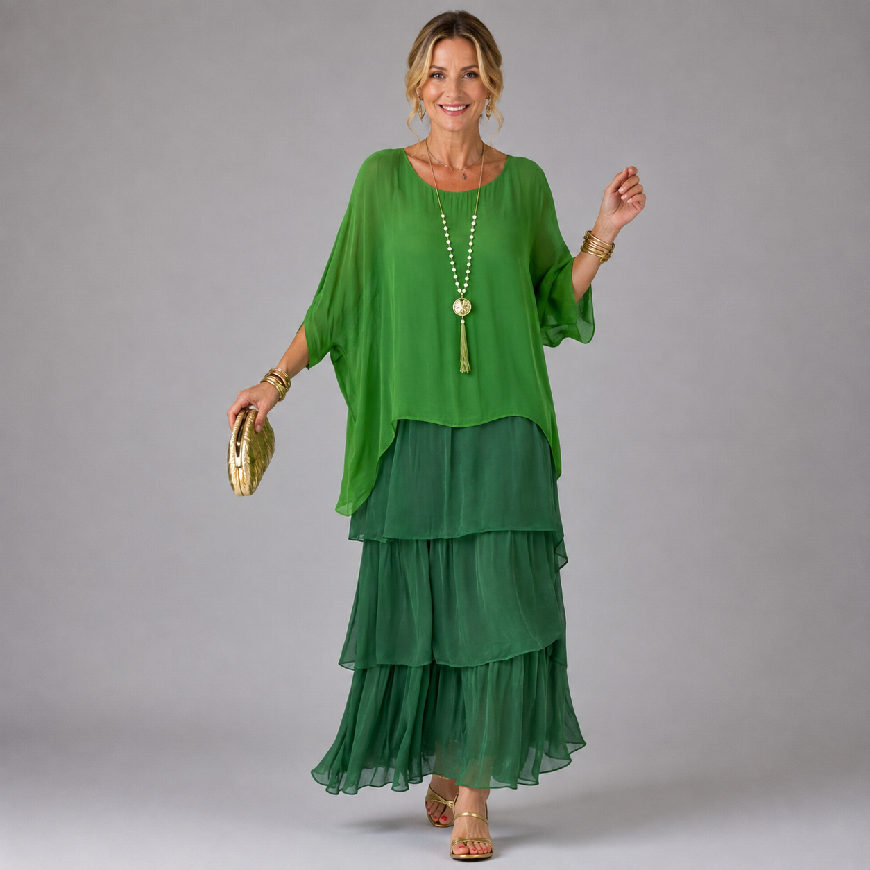 Green tiered maxi dress with layered skirt and loose dolman sleeves
