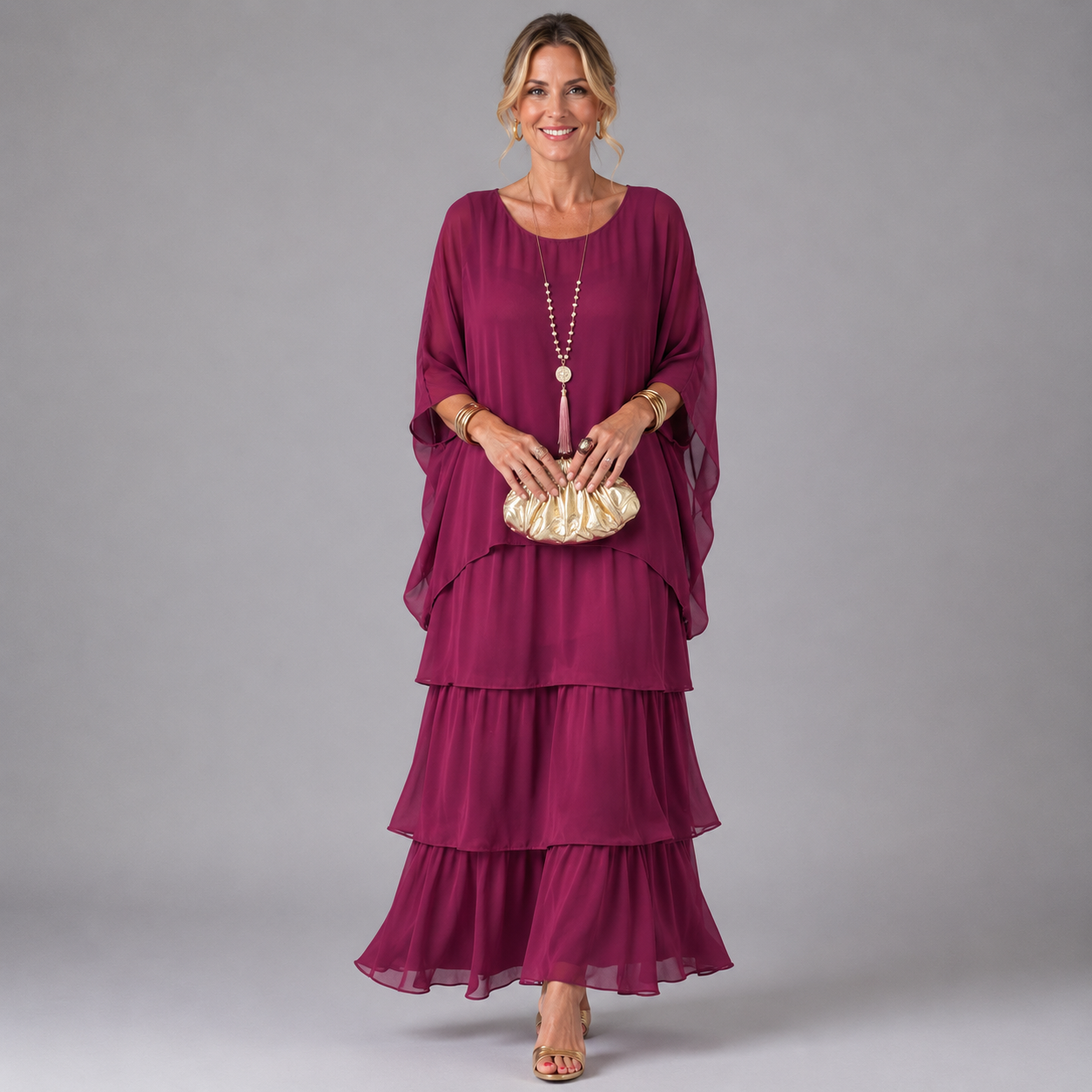 Burgundy tiered maxi dress with flowing layered skirt and loose, draped sleeves