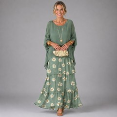 Sage green tiered maxi dress with daisy floral skirt and flowy layered ruffles