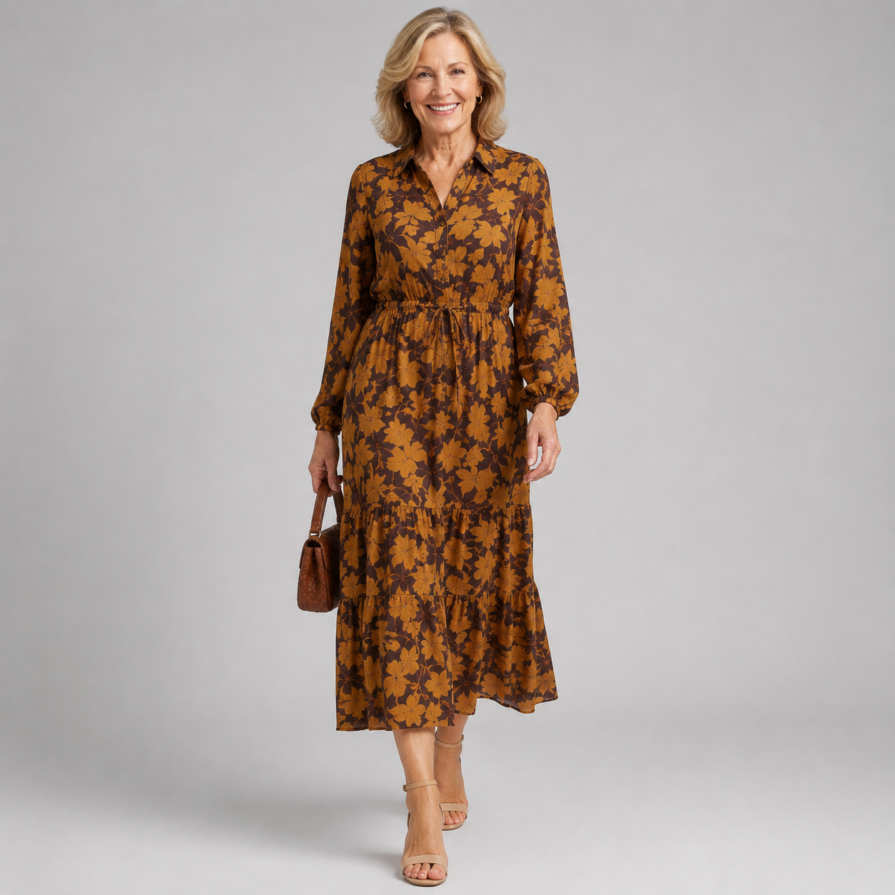 Brown floral midi dress with V-neck, gathered waist, and long sleeves