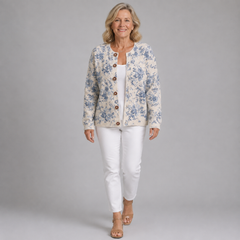 Vintage knit cardigan on model, blue floral on cream, button-front, long sleeves