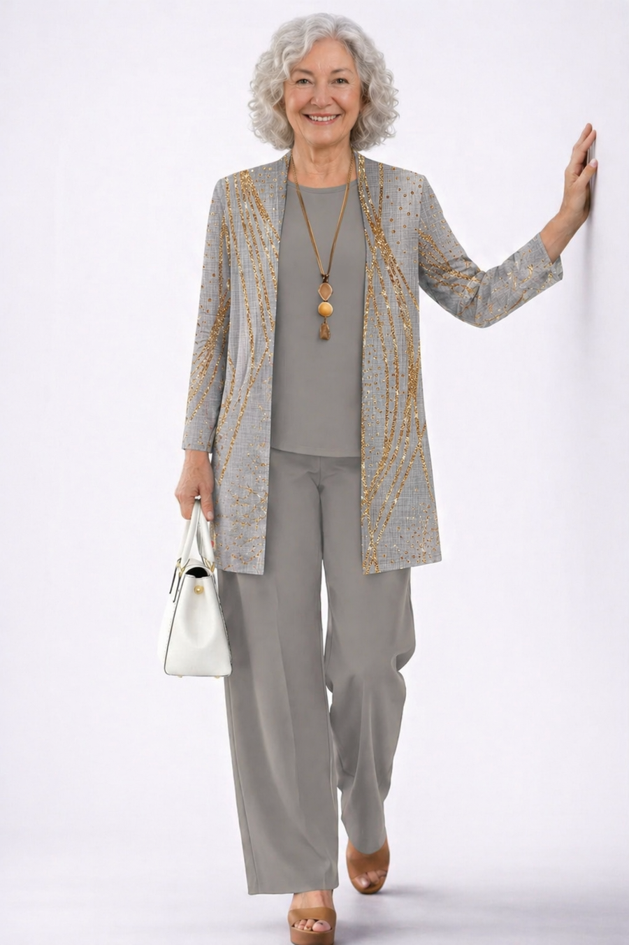 Three-piece trouser set with patterned blazer, gray trousers, and matching top