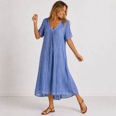 Abito estivo blu mediterraneo con scollo a V, maniche corte e gonna ampia