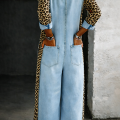Light blue denim overall back view with button detailing and bib pocket