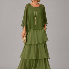 Green tiered maxi dress with dolman sleeves and scoop neckline, airy layered ruffle skirt