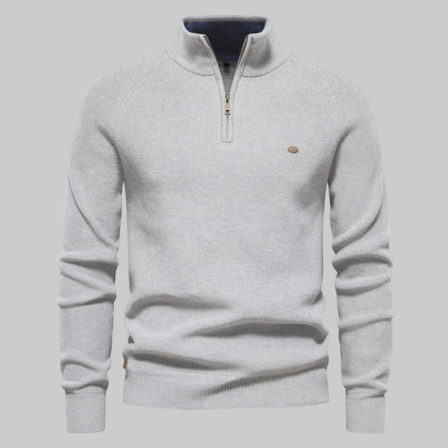 Light grey men’s half-zip pullover sweater with high collar and ribbed cuffs