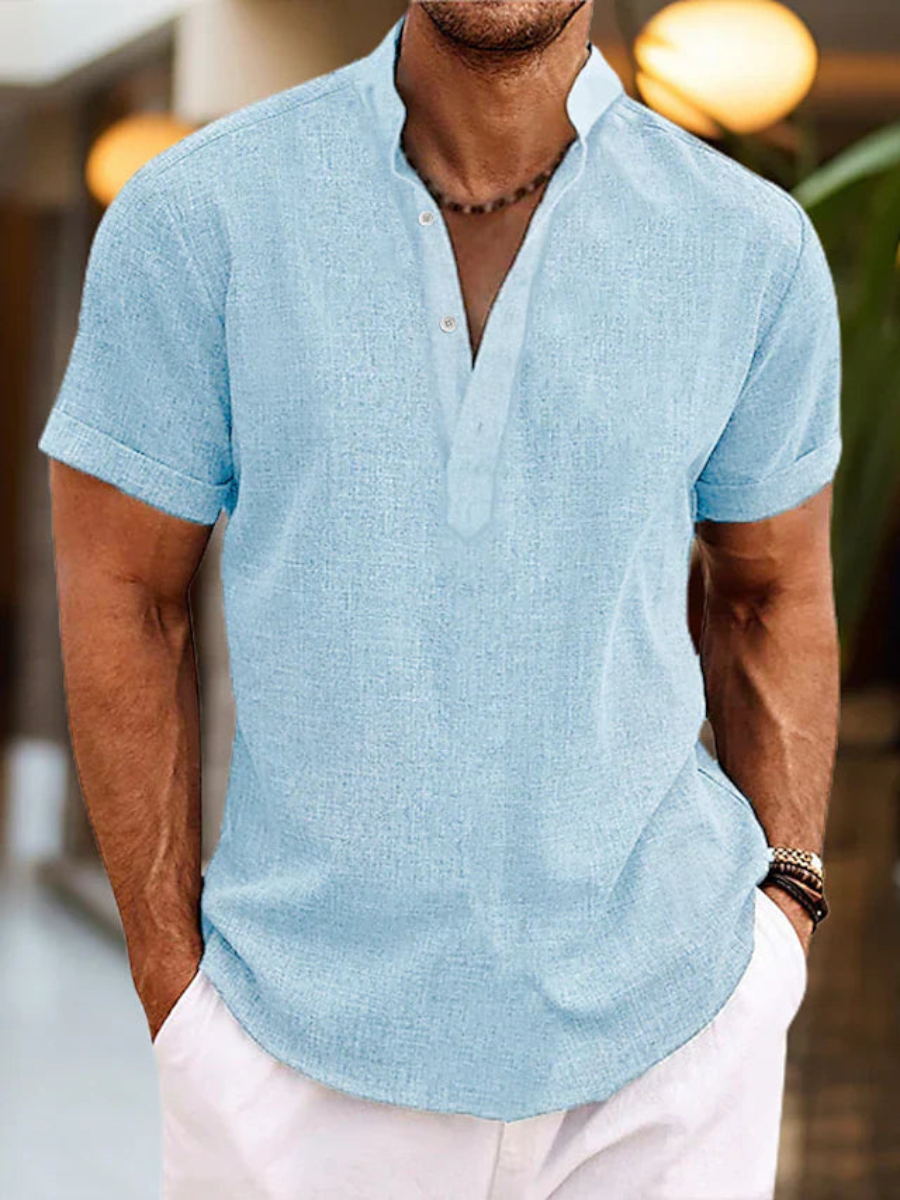 Men's casual short-sleeve polo shirt, light blue, button placket and fold-over collar.