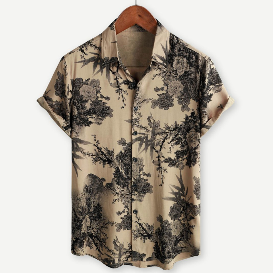 Men's short-sleeve button-up shirt with open collar and black floral on tan
