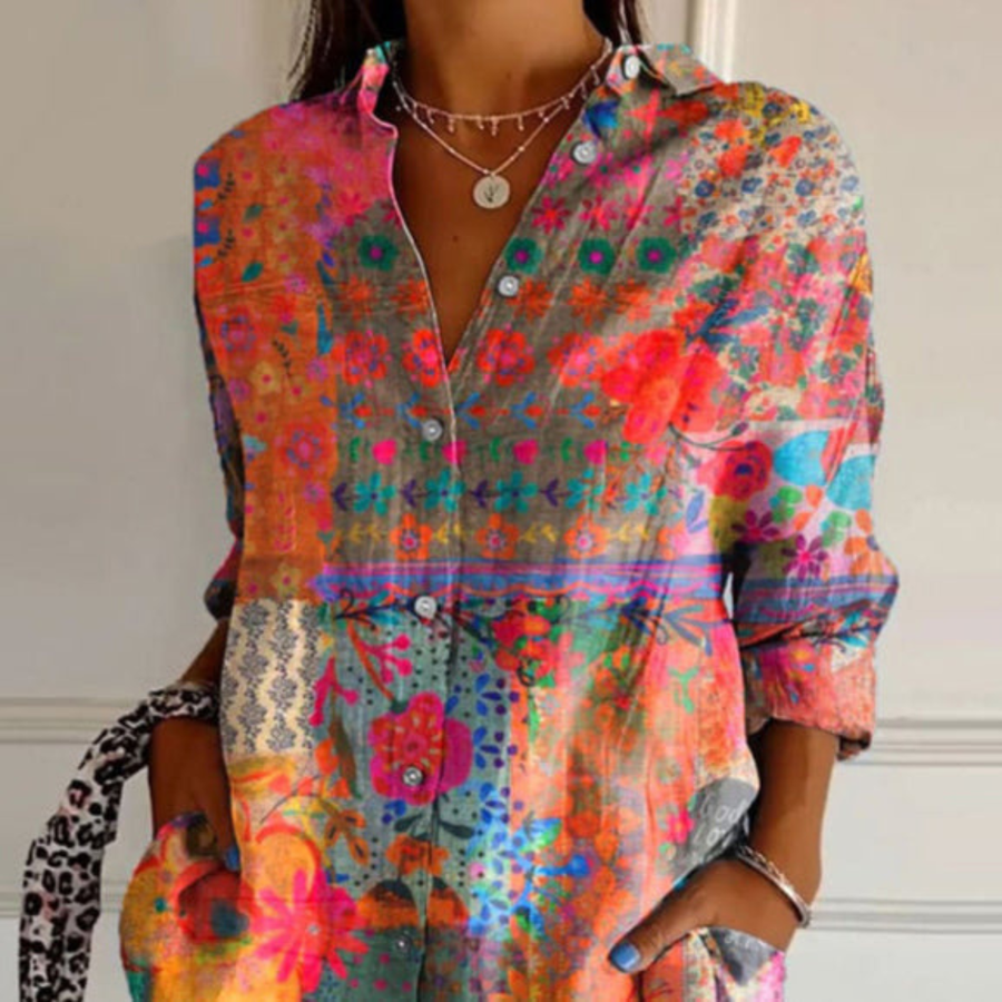 Multicolor floral long-sleeve blouse, partially buttoned with cuffed sleeves