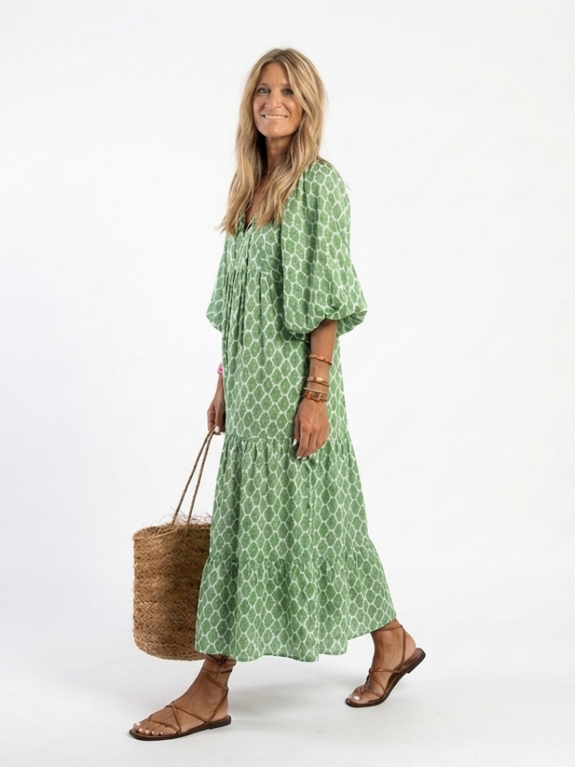 Green patterned V-neck midi dress, three-quarter puff sleeves and flowing skirt