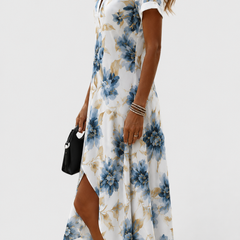 Vestito midi a fiori blu con maniche corte e scollo a V, spacco laterale, legatura in vita