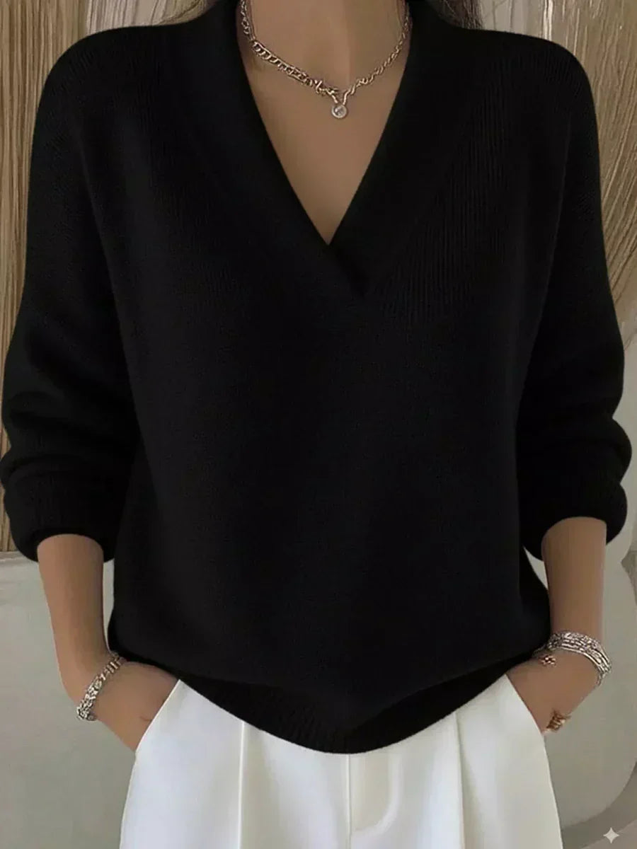 Black relaxed V-neck knit sweater with ribbed cuffs and hem, long sleeves
