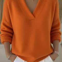 Orange relaxed V-neck knit sweater with ribbed cuffs and hem, long sleeves
