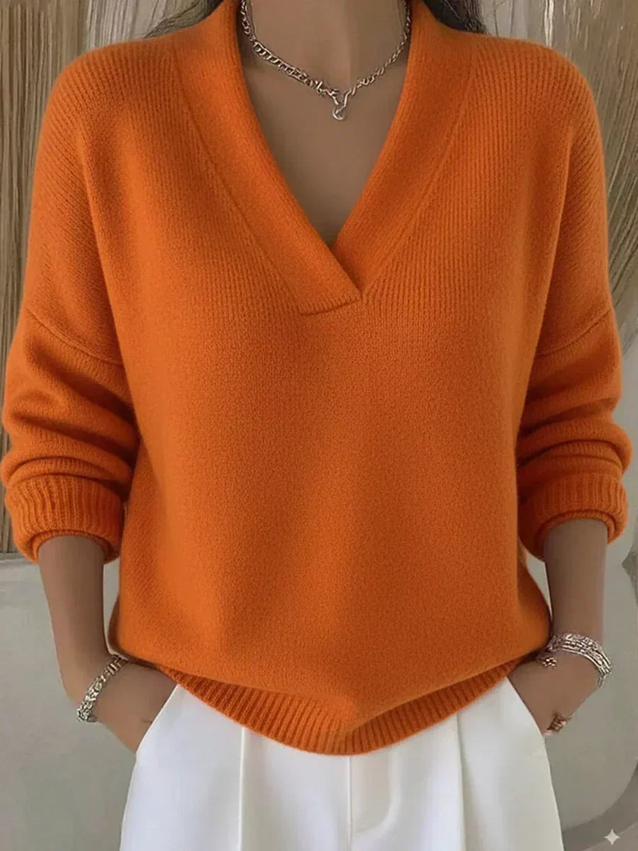 Orange relaxed V-neck knit sweater with ribbed cuffs and hem, long sleeves