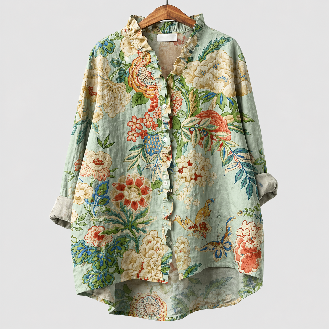Blusa estiva con stampa floreale verde e crema, scollo a V e bottoni, maniche lunghe