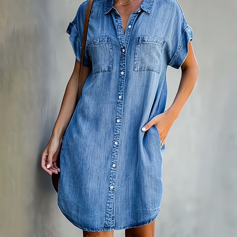Blue button-through denim shirt dress with short sleeves, collar, and chest pockets