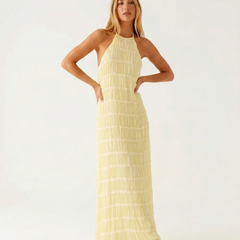 Abito lungo estivo giallo a balze con scollo halter e spalline sottili