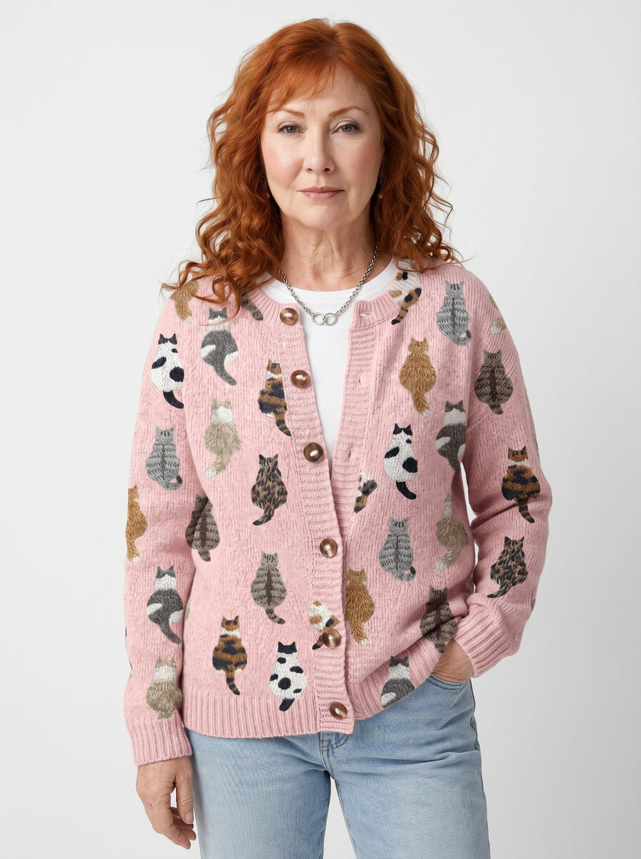 Pink cat-print cardigan with round buttons and long sleeves