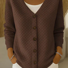 Brown quilted button-front cardigan with V-neck and long sleeves.