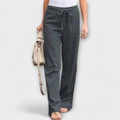 Wide-leg trousers with tie belt, dark grey fabric with elastic waist and wide, tapered drape