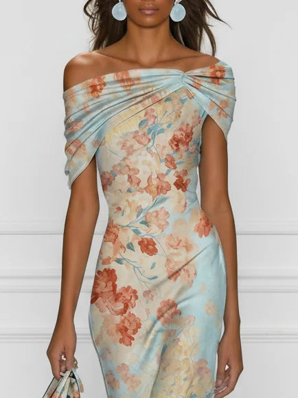 Off-shoulder midi mermaid dress close-up, blue floral print with ruched draped neckline