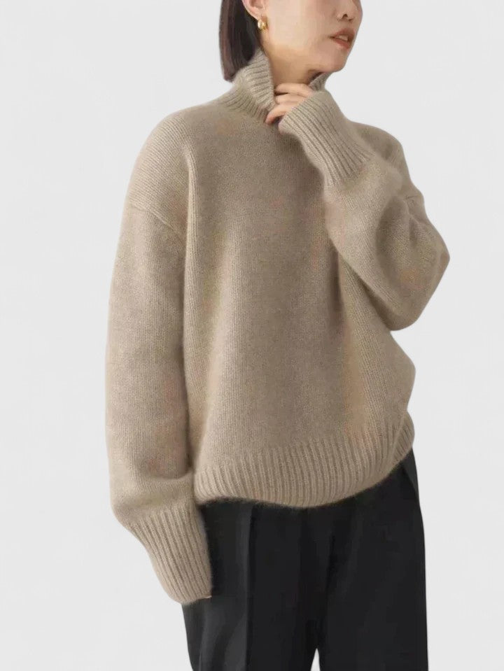 Beige turtleneck knit jumper with long sleeves, ribbed collar, cuffs and hem