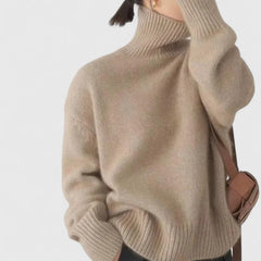 Beige turtleneck knit jumper with long sleeves and ribbed collar, cuffs, hem