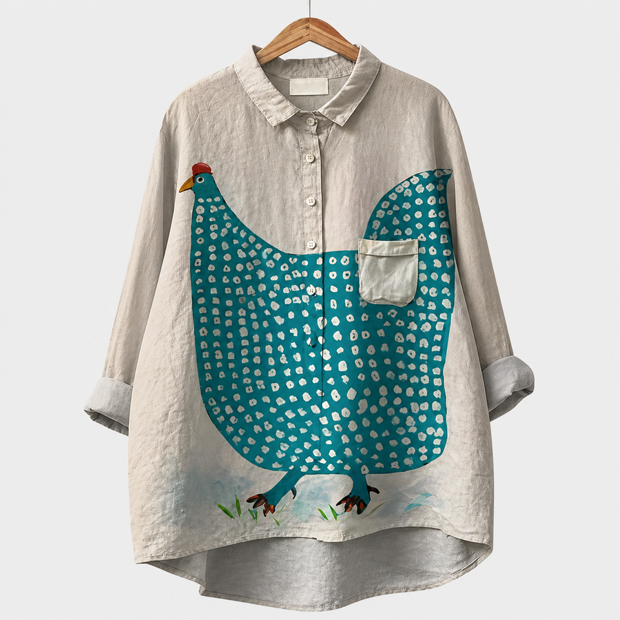 Blusa estiva in tessuto chiaro con stampa uccello azzurro e colletto