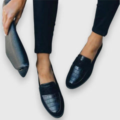 Mocassini neri slip-on effetto coccodrillo con cuciture laterali