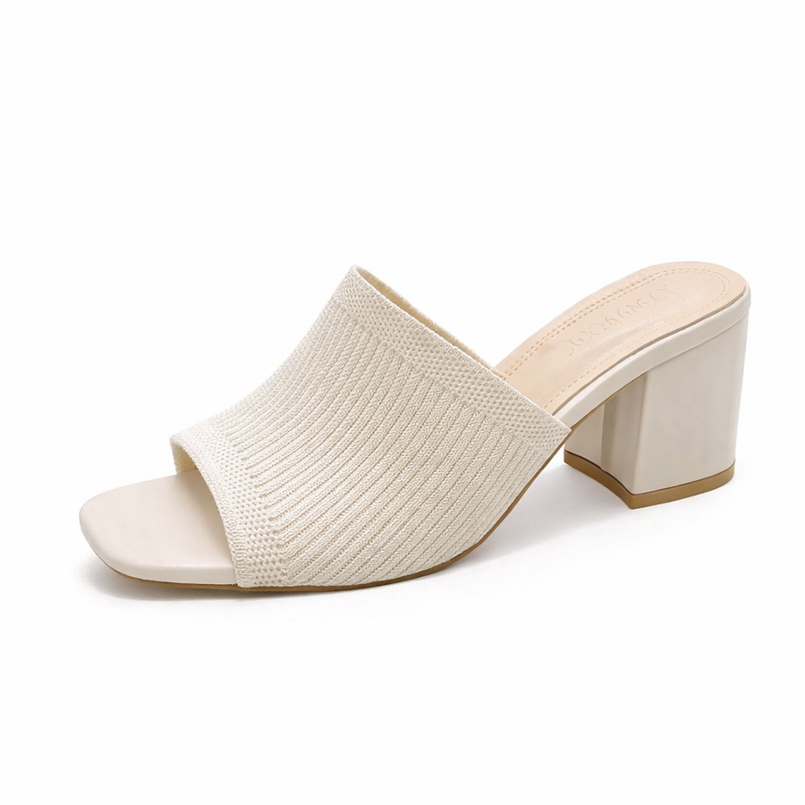 Cream textured slip-on block heel sandals with open toe and wide cuff