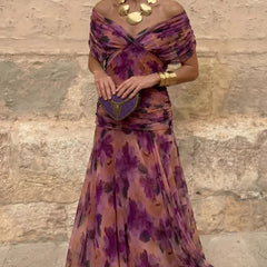 Abito da sera a fiori viola e verde, scollo bardot, cintura decorativa