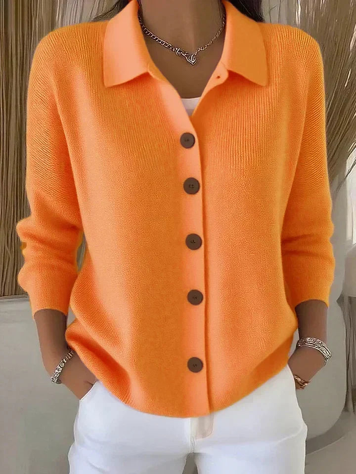 Orange button-front collared cardigan sweater with long sleeves, ribbed knit