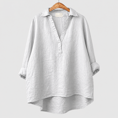 Blusa estiva oversize bianca con scollo a V e colletto a camicia, maniche a mantella