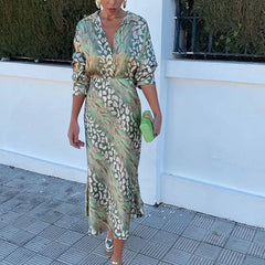 Green and beige patterned button-front midi dress with tie waist