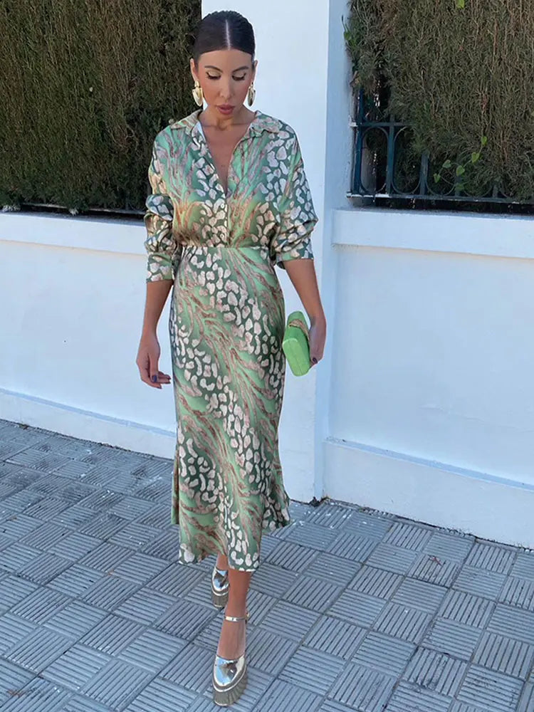 Green and beige patterned button-front midi dress with tie waist