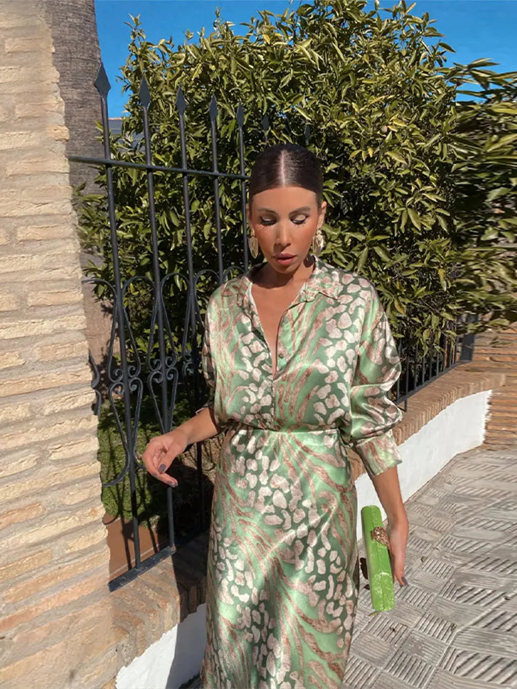 Green and beige patterned V-neck midi dress with gathered tie waist