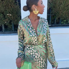 Green and beige patterned long-sleeve midi dress with tie waist