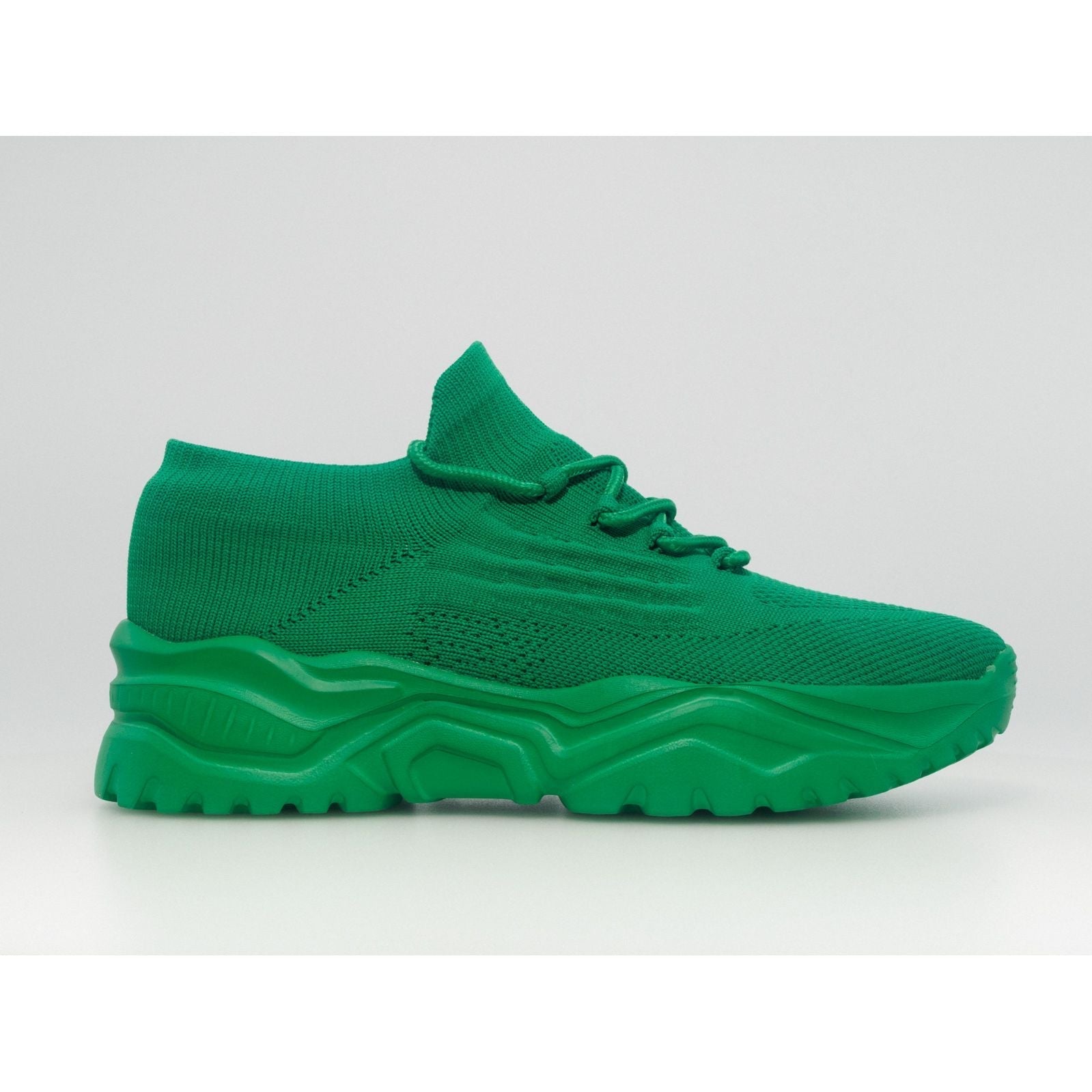 Scarpe ortopediche comode in tessuto verde con suola spessa verde e lacci